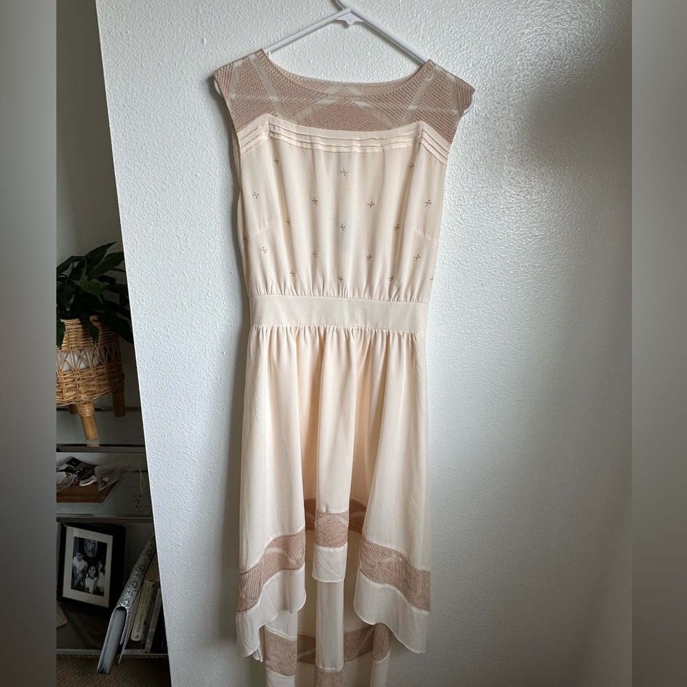 Esley Boho Cream colored high/low dress. With sheer embroidered detail. Size M